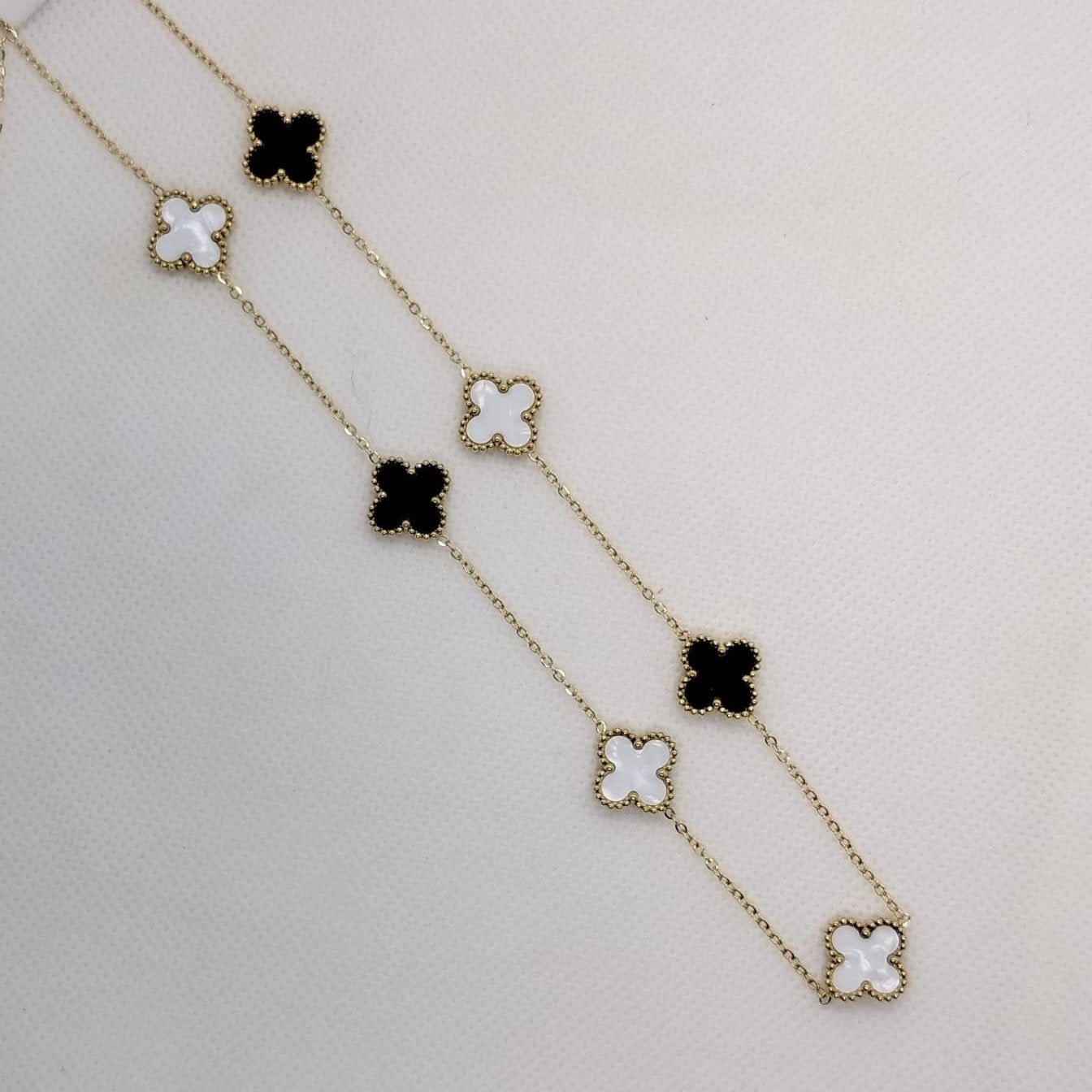 Elegant Clover-Link Necklace with Black and White Accents