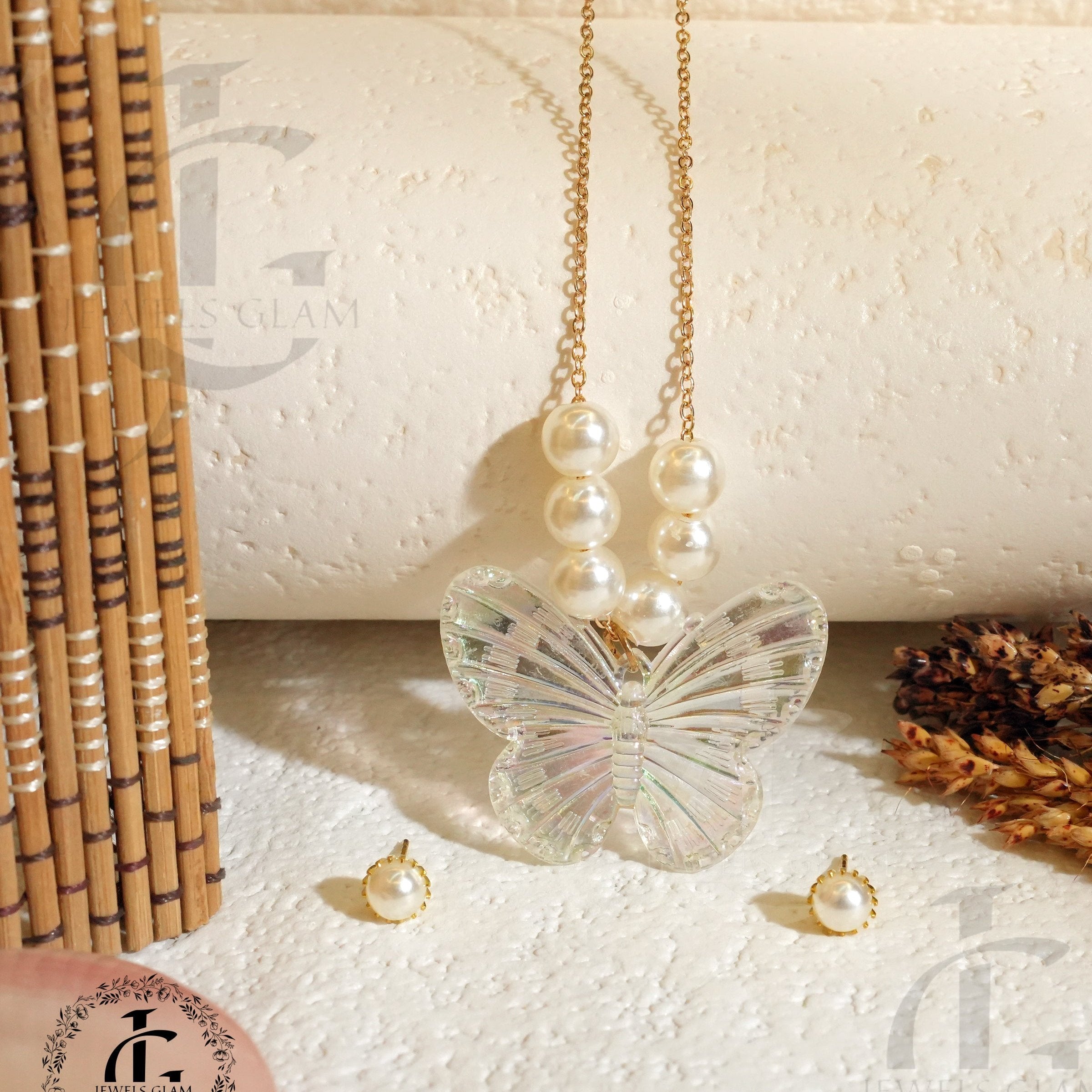 Crystal Butterfly Pendant Necklace with Pearl Accents